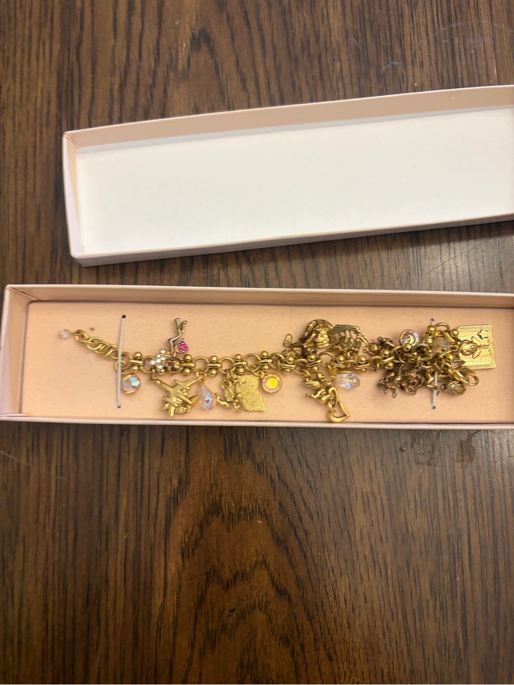 Kirks Folly vintage Gold tone angel and mixed CharmsBracelet IOB 1990’s.
